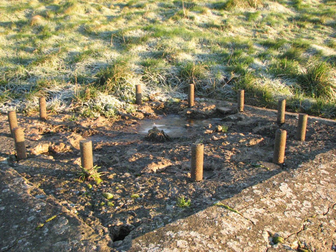 Concrete mast base with ring of studs